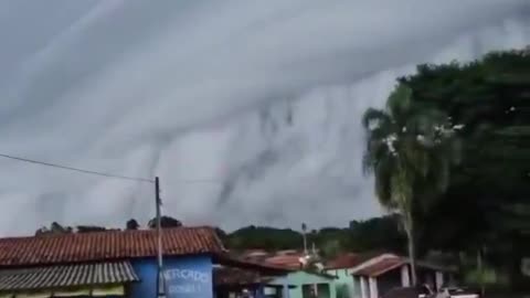 Massive thundercloud engulfs Brazilian towns, creating terrifying visuals.