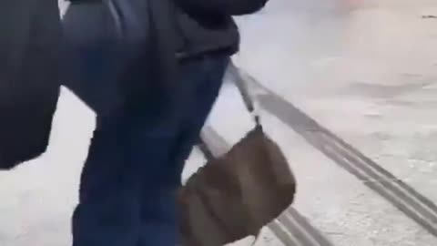 migrant in paris throwing poop