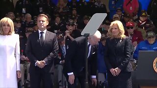 Joe Biden shits himself and points it towards Macron during the D-day celebration..