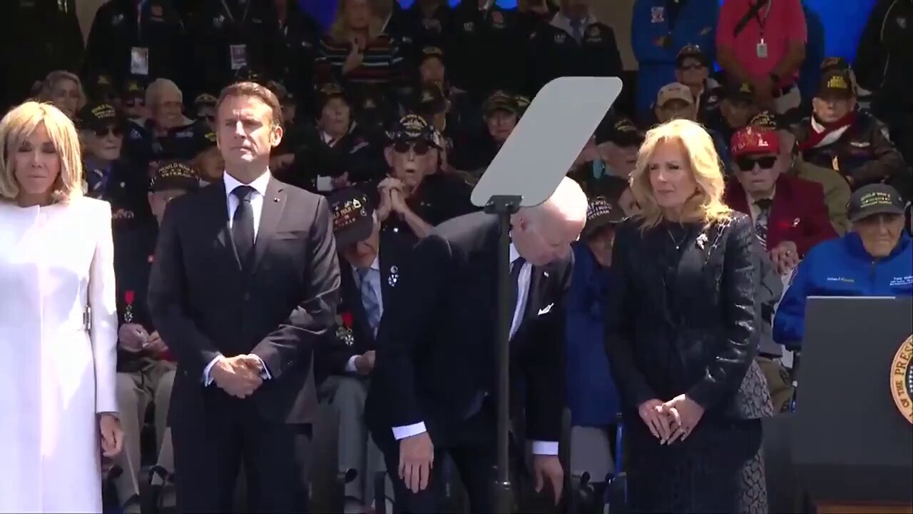 Joe Biden shits himself and points it towards Macron during the D-day celebration..