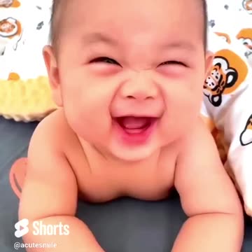 baby laughs