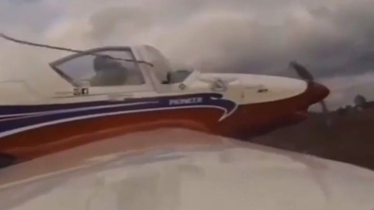 Russian Pilot Nearly Gets Decapitated By A Wire While Flying His Plane Way Too Low