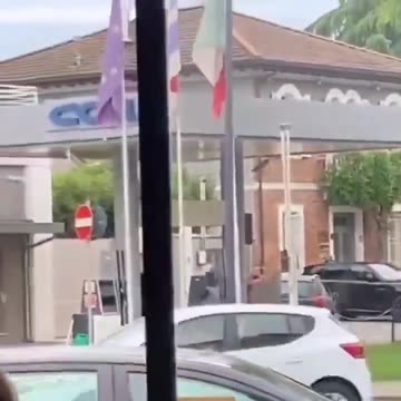 African migrant setting fire to gas station in Italy