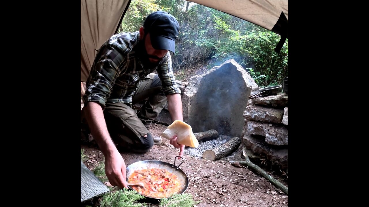 survival camping and wilderness cooking in the forest