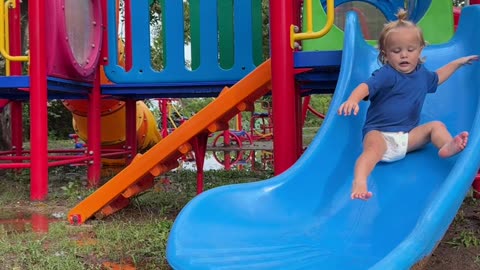 Baby Slides Into Mud Puddle