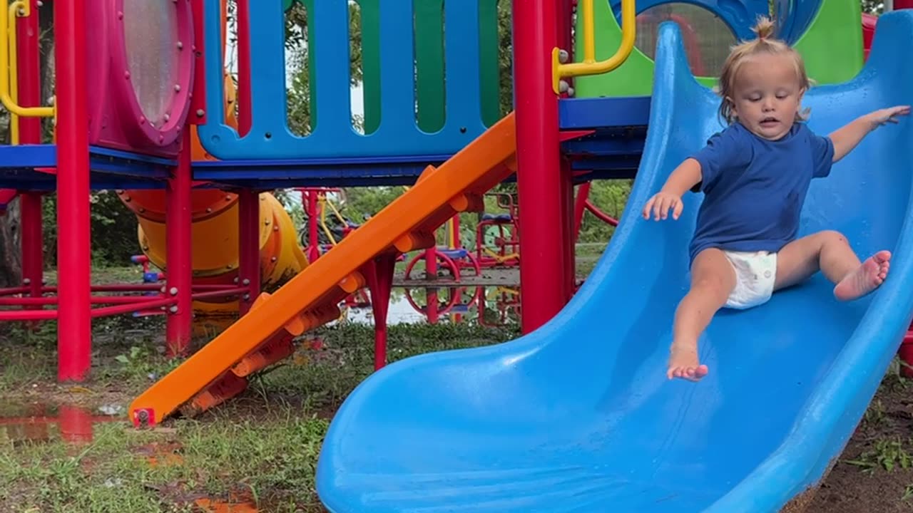 Baby Slides Into Mud Puddle