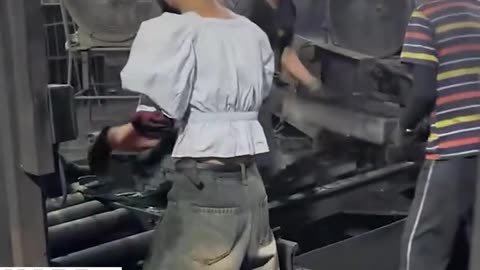 Hard working woman inside a factory.hd