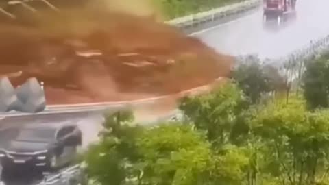 LANDSLIDE LEAVES A ROAD CUT OFF