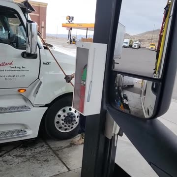 Let's wash our tuck with the windshield squeegee