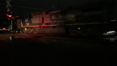 CSX Train engine 915 and YN2 449 come out of the dark