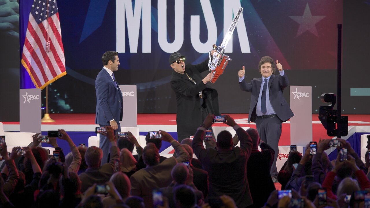 Elon Musk Raises Chainsaw on Stage at CPAC with Argentine President Javier Milei