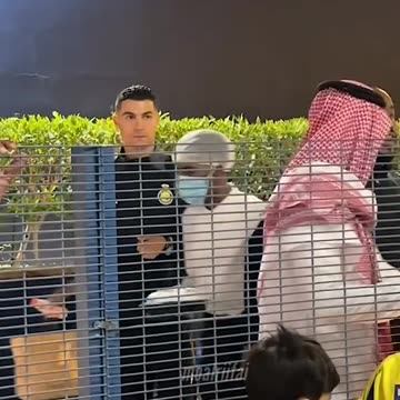 Cristiano Ronaldo with his child fans