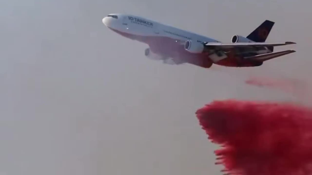 Red fire retardant foam, for class B fires, forms a barrier that cuts off oxygen