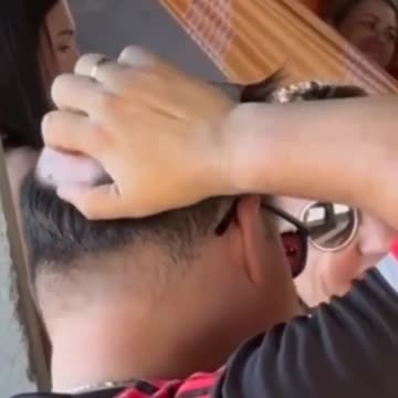 The Man sratch under his...