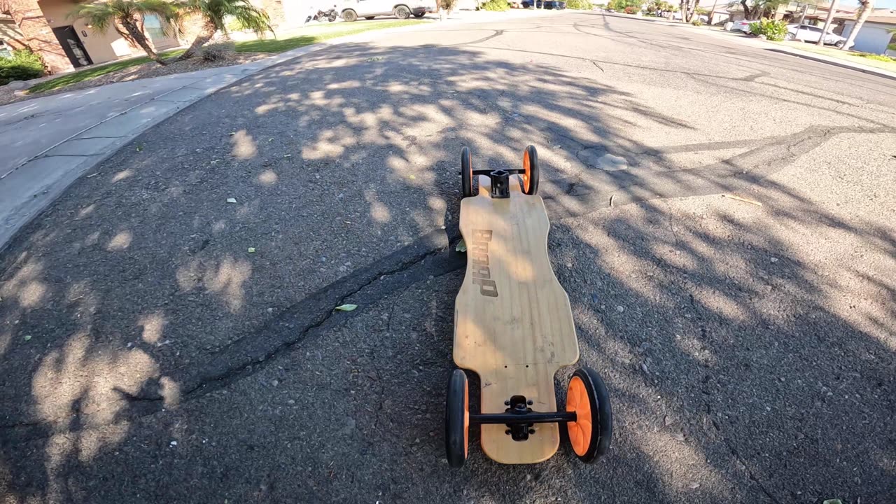 Big wheel longboard so smooth with a handle making an epic ride