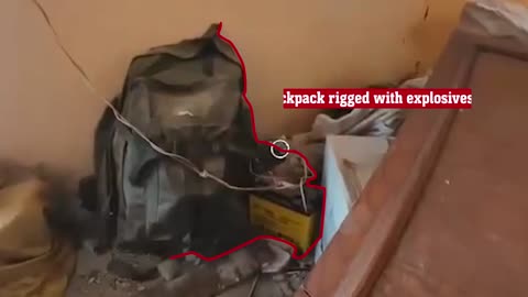 Drone footage of a room rigged with explosives in the Rafah area: