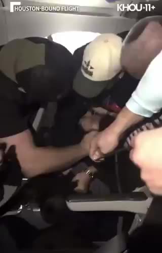 Pandemonium ensues on a Frontier Airlines flight when an unruly passenger goes on a tirade
