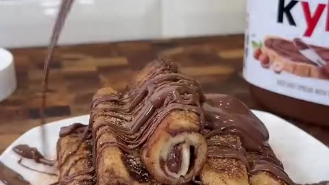 🍫🍞 Indulge in the deliciousness of Nutella French Toast Roll! 🤤