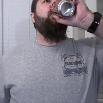 Slammin' a can of Flamin' hot Mountain Dew