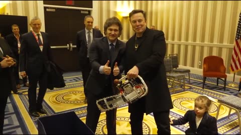 Elon Musk & Argentina's Javier Milei backstage at CPAC with a golden chainsaw