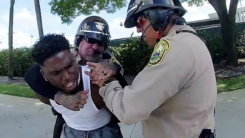 Shocking Bodycam Video Tyreek Hill Slammed by Miami Police