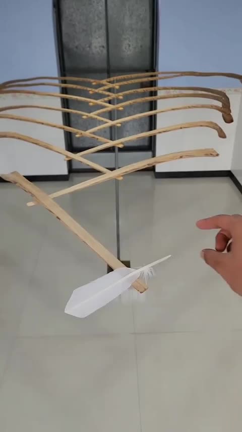 Demonstrating stability and balance with wooden sticks