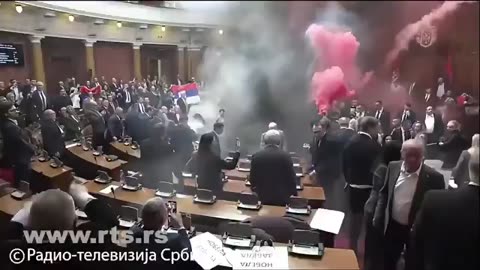 Chaos in Serbian parliament as opposition sets off smoke grenades and tear