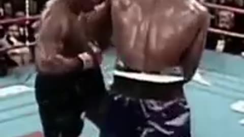 Mike Tyson versus Evander Holyfield, Centered body shot and uppercut