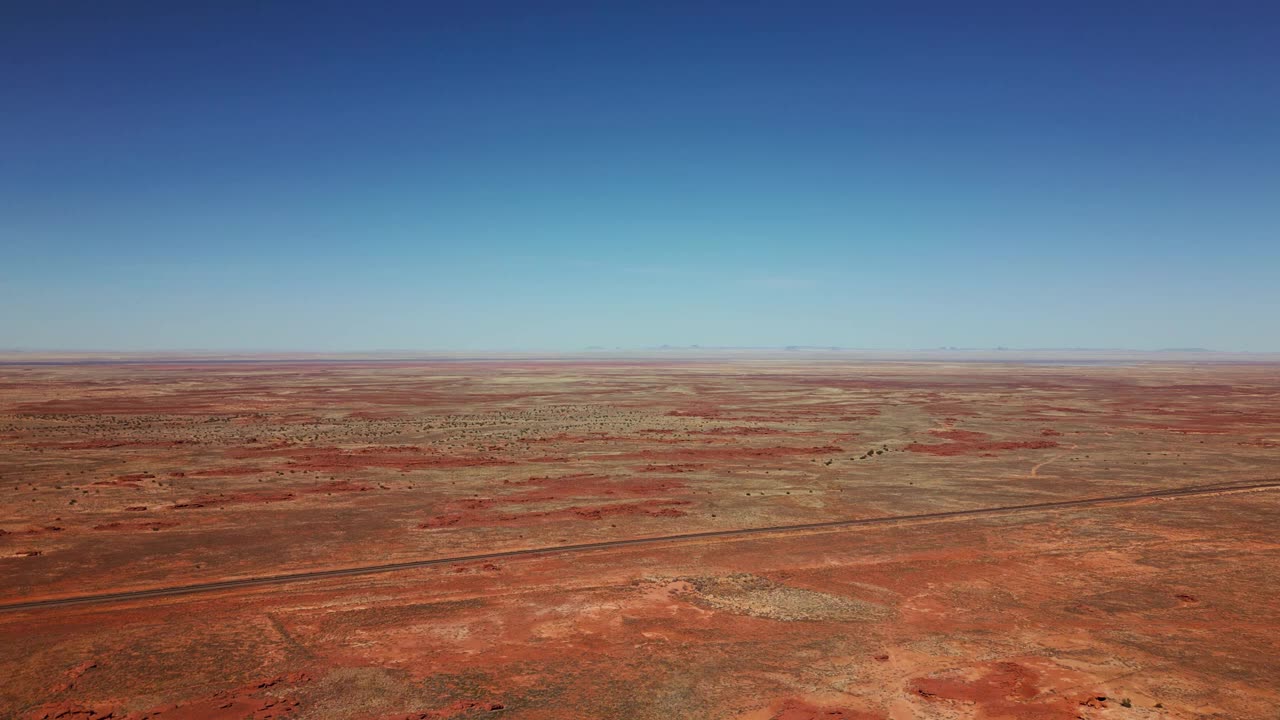 Mixkit Large Desert on a Sunny Day in an Aerial View