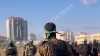 Armed Hamas terrorists training in North Gaza, chanting their loyalty to the