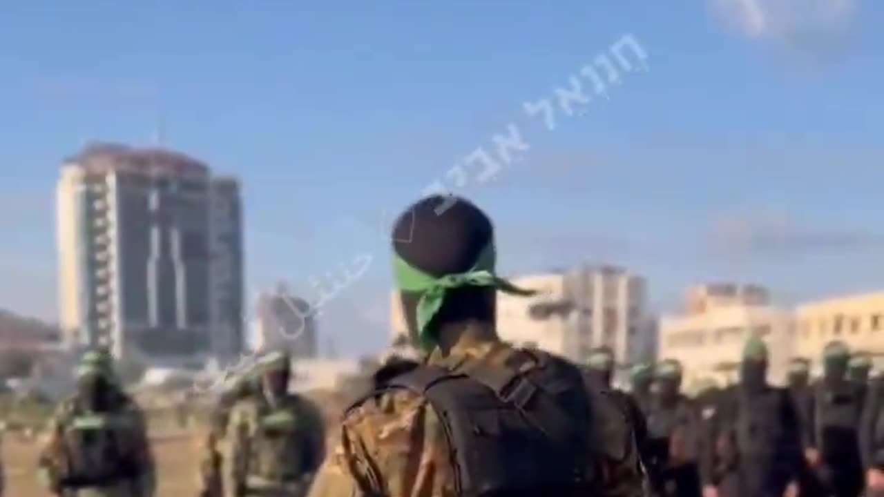 Armed Hamas terrorists training in North Gaza, chanting their loyalty to the