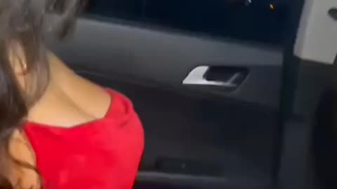 Red outfit cute 🥰 girl in the car