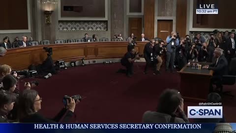 RFK Jr. gets a standing ovation from the audience as he leaves the hearing