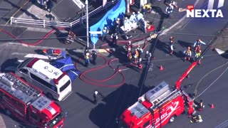 In Japan, a truck plunged into a massive sinkhole at a busy intersection