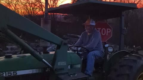 John Deere Tractor and Big Ash Log