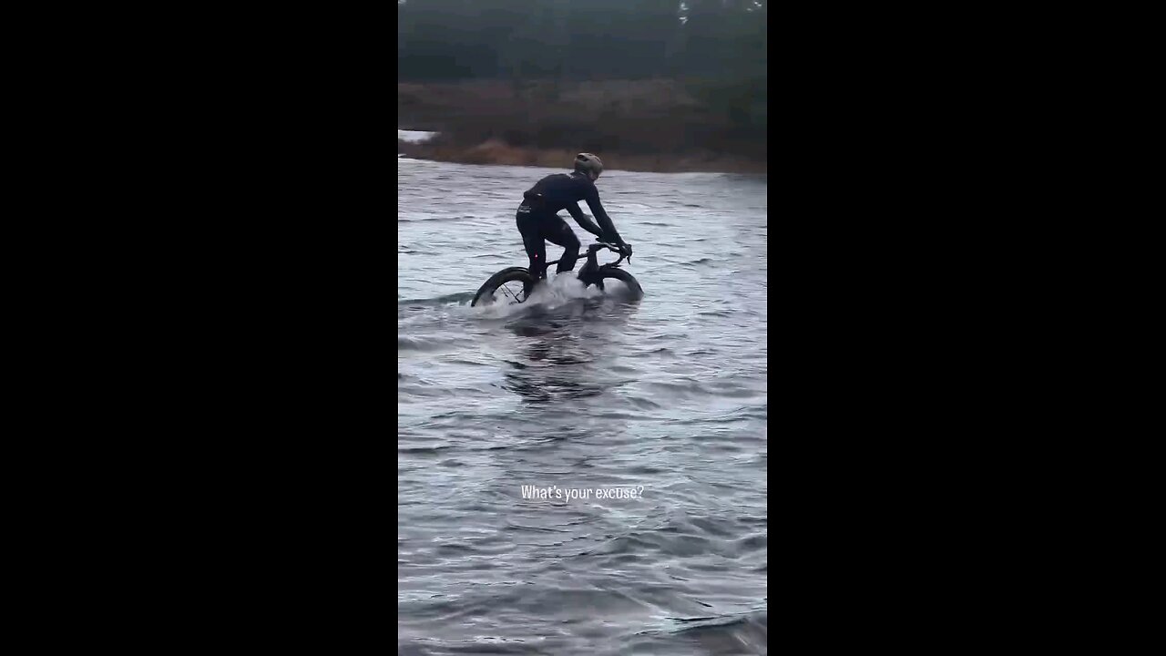 "Man Crosses the River on a Bicycle"