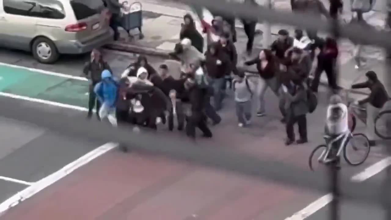 Mob Attacks Man at LA City Hall During Anti-Deportation Protest.