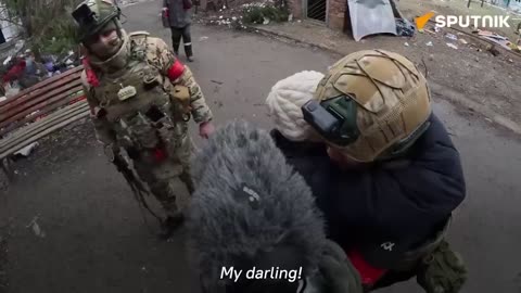 Residents of a city in Ukraine welcome Russian soldiers