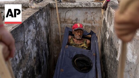 Cubans celebrate life and death with a mock funeral