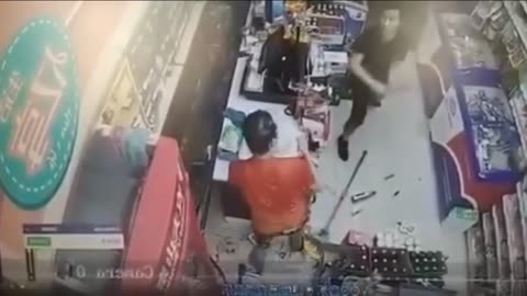 Robber Armed with a Knife Gets Smashed with 6 Beer Bottles!