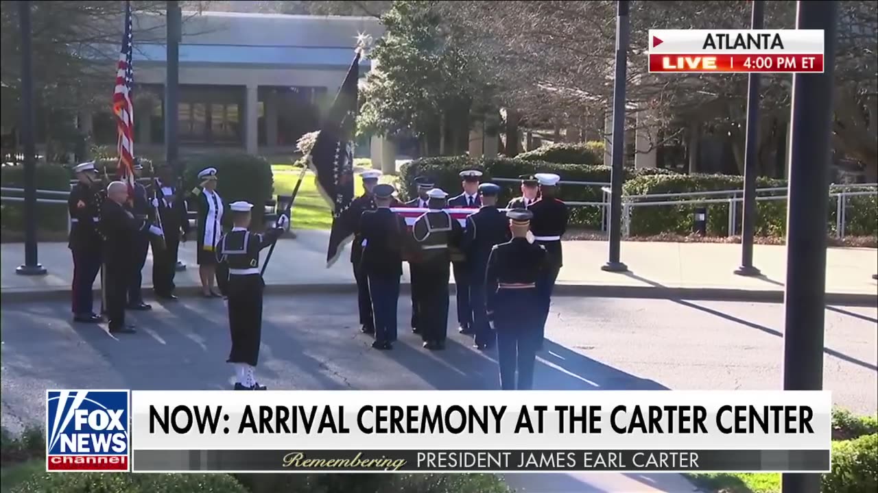 Former President Jimmy Carter’s motorcade arrives at Carter Center