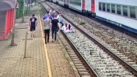 Woman tries to kill herself by jumping in front of incoming train