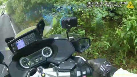 Flatbed truck reverses into motor officers bike during high-speed pursuit