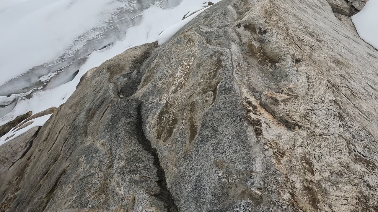 Climbing through bedrock and snow in Vallunaraju