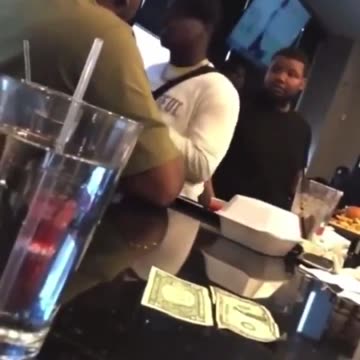 Man slapped and knocked out for using racial slur. Instant Karma.