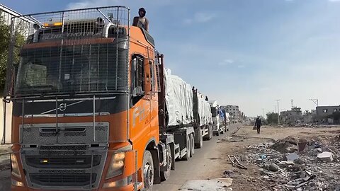 Trucks loaded with aid cross into Gaza Strip as ceasefire takes hold