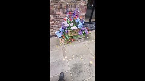 Flowers outside a building in London Docklands