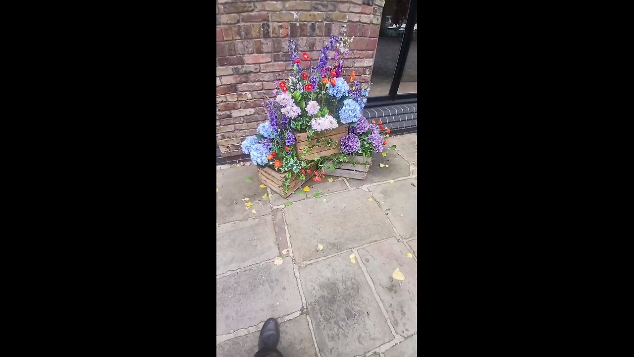 Flowers outside a building in London Docklands