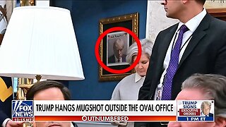 Trump hangs iconic mugshot outside the Oval Office