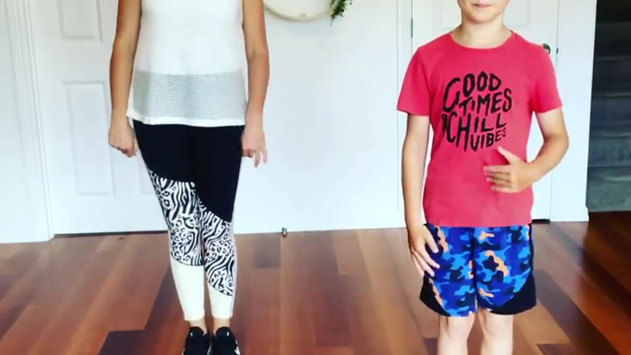 Mother and son rehearsing a dance